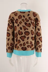 Back view of leopard print knit sweater with blue ribbed trim detail