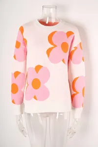 Stylish women's crew neck knit sweater featuring large pink and orange floral patterns.