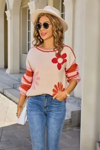 Stylish women's round neck long sleeve sweater with floral and stripe pattern designs