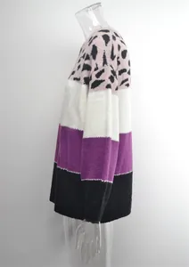 Side view of women's color block leopard print round neck knit sweater on mannequin