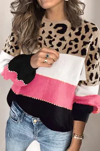 Macro view of women's leopard print patchwork color block knitted sweater texture