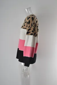 Side view of women's spliced leopard print color-block knit pullover sweater top