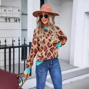 Stylish leopard print knit sweater for women with contrasting turquoise ribbed trim.