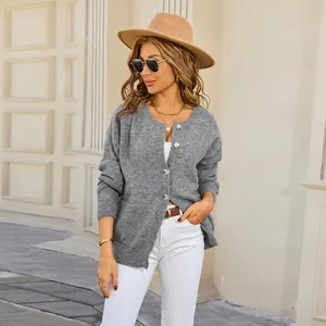 Women's casual grey oversized knit cardigan sweater with round neck and front pockets