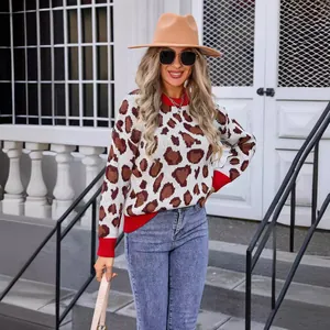Fashionable women's leopard print pullover sweater with vibrant red ribbed trim details