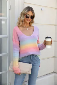 Detail view of a vibrant rainbow gradient tie-dye knit sweater with a stylish V-neck design.