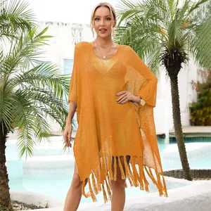 Stylish mustard yellow hollow-out knit beach cover-up with long decorative tassel fringe