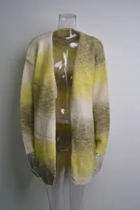 Oversized women's knit cardigan featuring a yellow and beige ombre gradient effect