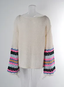 Detailed view of cream crochet beach cover-up with colorful striped bell sleeves.