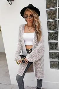 Elegant chevron pattern long-knit cardigan for women in a chic street style outfit