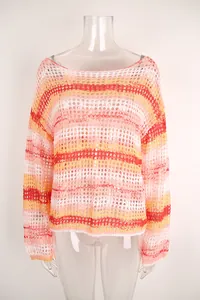 Detail showing the intricate crochet hollow-out texture of this colorful beach cover-up.
