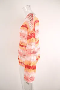 Side view of a colorful striped hollow-out crochet long-sleeve beach top