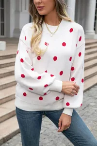 Fashionable white crew neck pullover sweater featuring vibrant red polka dots patterns