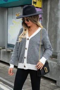 Fashionable women's black and white chevron knit cardigan with V-neck and buttons