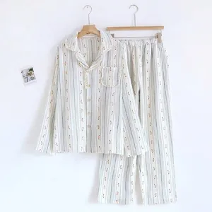 Detail view of floral striped cotton gauze pajama set with lapel design