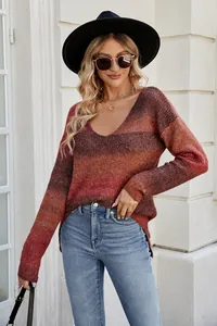Detail view of women's V-neck knit sweater with a reddish-brown gradient dye pattern