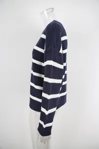 Side view of a vintage navy and white striped knit sweater on a mannequin for detail.