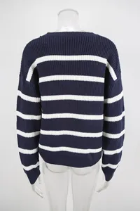 Back view of a navy and white striped knit sweater showing ribbed texture and loose fit