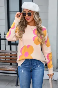Fashionable women's crew neck knit sweater with vibrant oversized floral print pattern