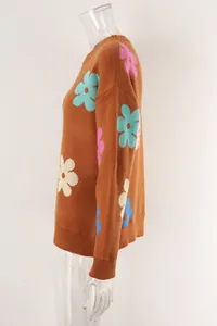 Side view of brown knit sweater featuring vibrant multi-color flower patterns
