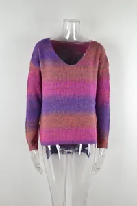 Close-up detail of purple ombre V-neck knit sweater with unique irregular hemline design.