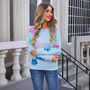 Blue crew neck knit sweater with colorful flower patterns for women spring fashion.