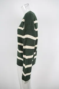 Side view of vintage style oversized green and white striped knit sweater for women