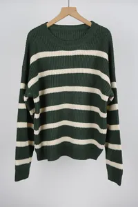 Vintage loose-fit striped knit sweater in dark green and white for a preppy autumn look
