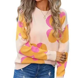 Cozy women's round neck knit sweater featuring large pink and yellow floral patterns