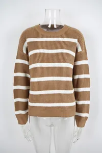 Detailed front view of brown and white horizontal striped knitted oversized sweater for women