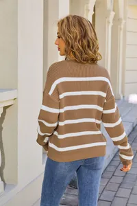 Detailed back view of a women's cozy oversized brown and white striped knit sweater top