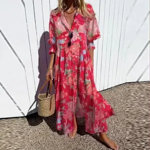 Elegant red floral print maxi dress featuring a collared button-down design and puff sleeves.