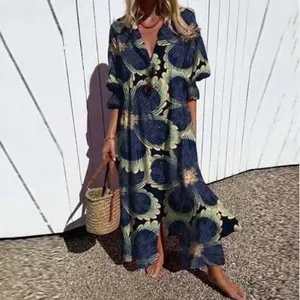Detail view of elegant floral print maxi dress with lapel collar and long sleeves