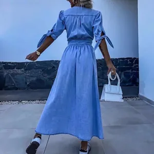 Elegant light blue faux denim midi dress with cinched waist and tie sleeves for women