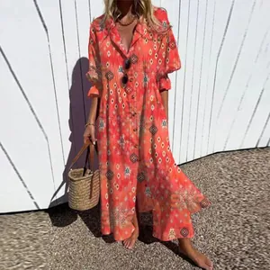 Elegant bohemian print maxi dress with lapel collar and front buttons shown on model