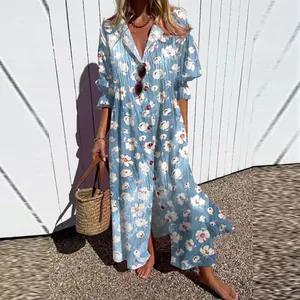 Elegant light blue floral print maxi dress featuring a lapel collar and full button front