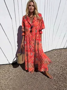 Elegant orange geometric print maxi dress with lapel collar and button front for women