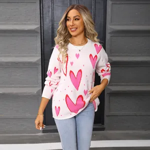 Stylish women's loose pink knitted sweater with red heart patterns for casual wear