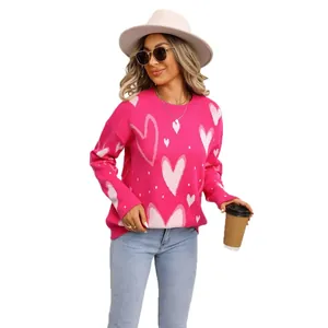 Women's oversized crew neck sweater with pink and white heart patterns