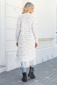 Rear view of long multi-colored knit cardigan with fringe detailing and soft macro texture