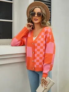 Stylish women's orange and pink checkered knit cardigan with v-neck and buttons detail