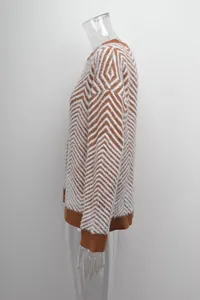 Side view detail of women's fluffy long-sleeve knit sweater with brown chevron pattern design