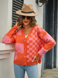 Stylish V-neck knitted cardigan featuring a vibrant pink and orange checkerboard pattern