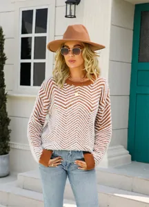 Stylish women's crew neck pullover knit sweater with orange and white chevron pattern.