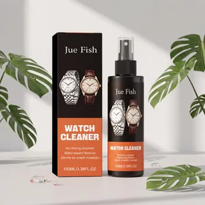 Professional watch cleaner spray with packaging box and decorative Monstera leaves.