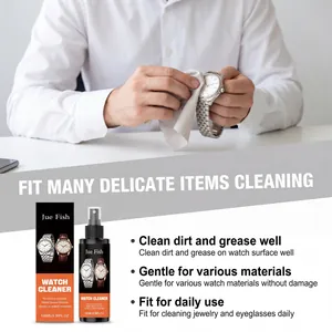 Close-up of a man using Jue Fish Watch Cleaner to polish a silver metal wristwatch band.