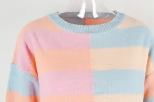 Close-up of color-block striped round neck knitted sweater with pastel hues