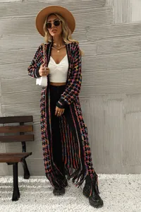 Western style long colorful knit cardigan featuring a fringe hem and vibrant patterns