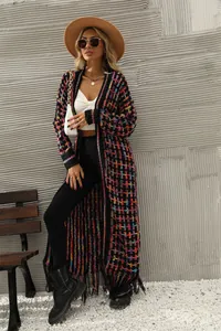 Full body view of a vibrant multi-color knit long cardigan with tassel hem and fringe detail