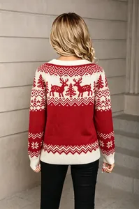 Back view of a red and white vintage Christmas sweater featuring reindeer jacquard patterns